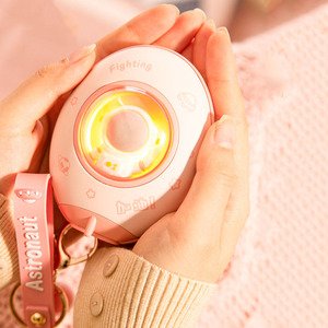 Зовнішній акумулятор + грілка для рук Wekome 5000mAh рожевий